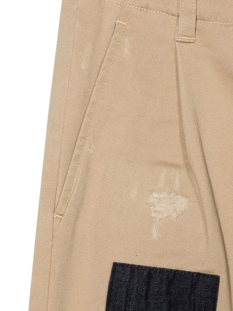 Shop Dsquared2 Pants With Patches In Beige