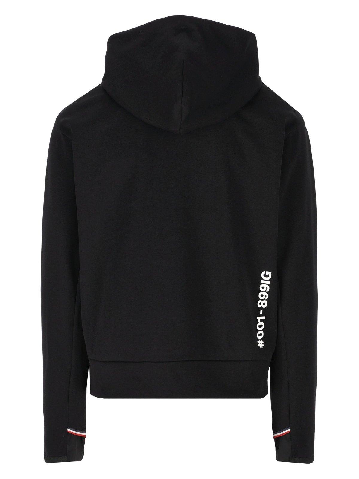 Shop Moncler Logo Printed Drawstring Hoodie In Black