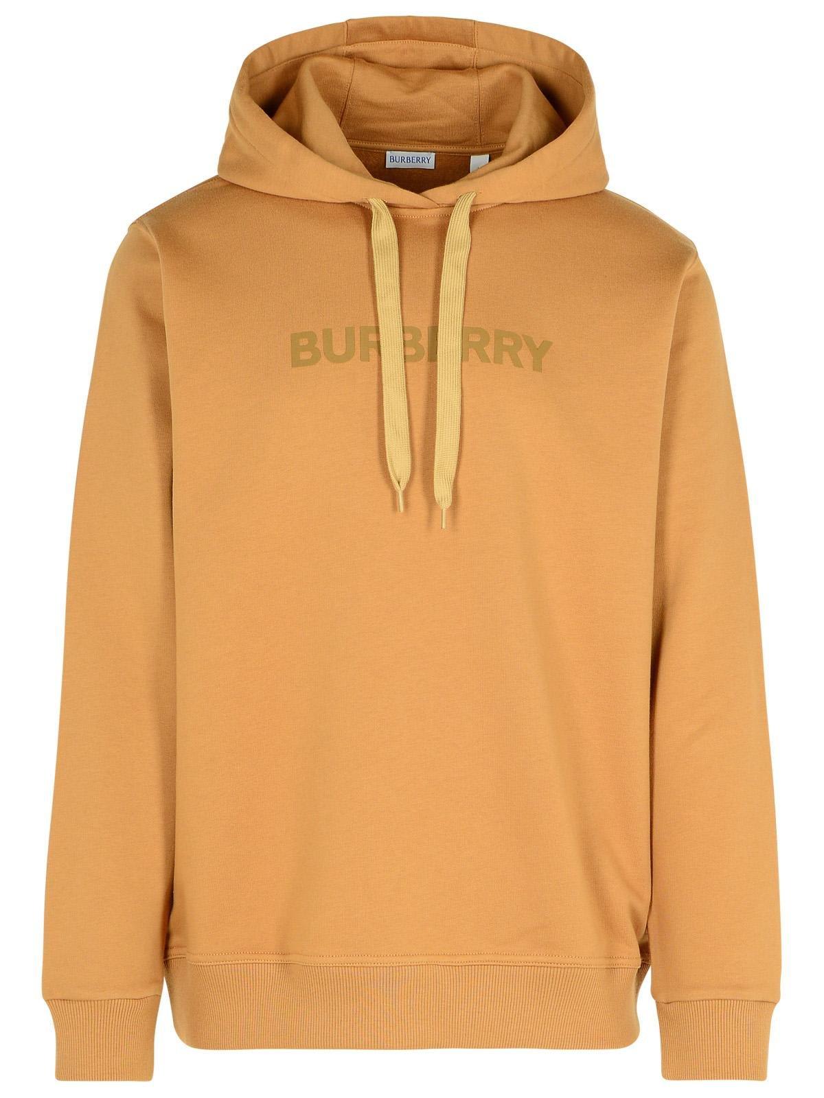 Shop Burberry Logo Printed Drawstring Hoodie In Beige