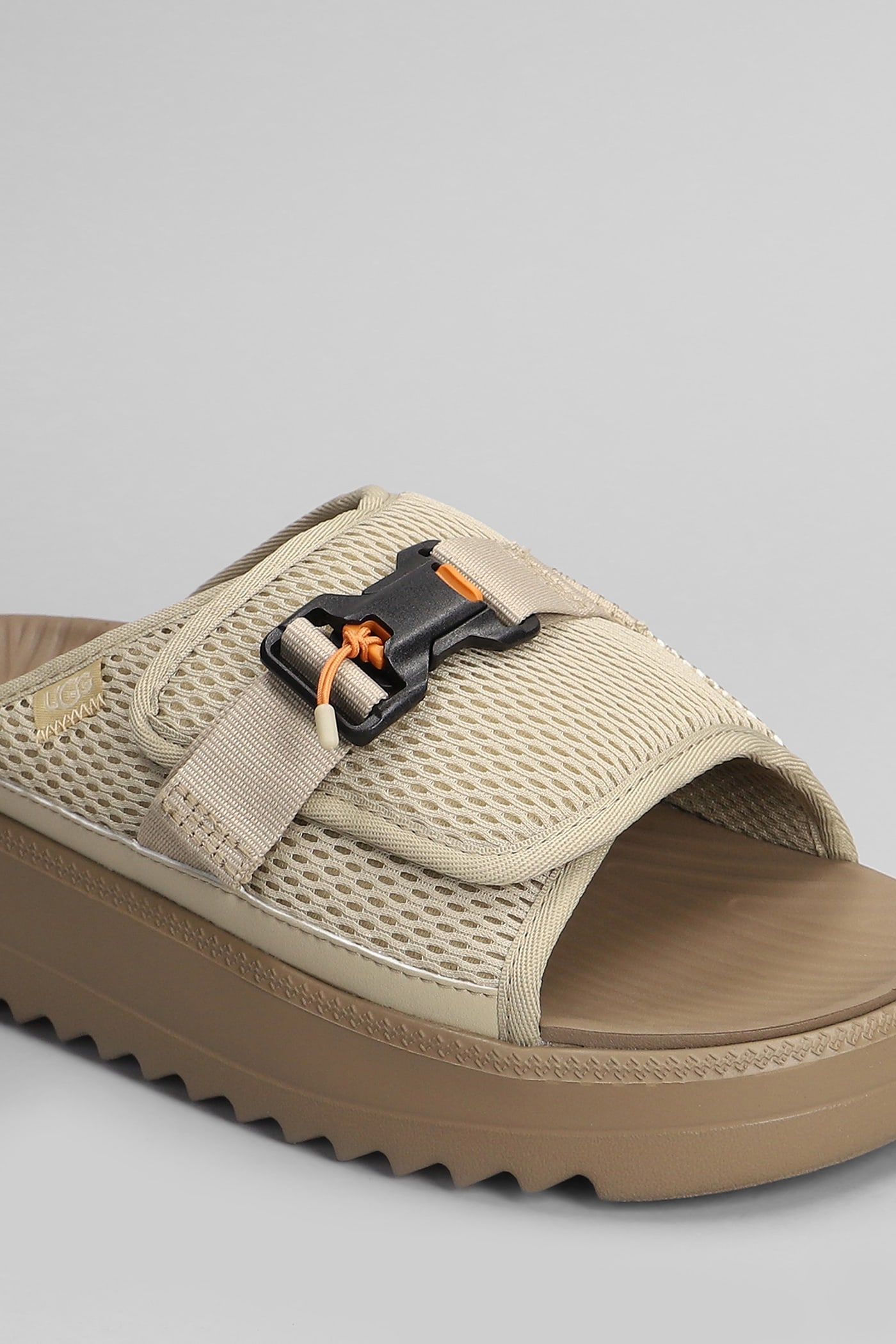 UGG MAXXER SLIDE 2.0 FLATS IN BEIGE FABRIC