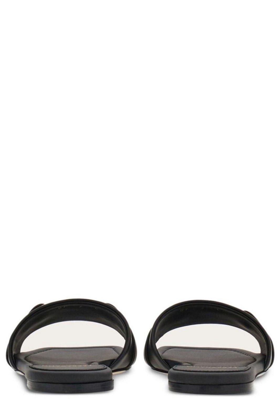 Shop Ferragamo Gancini Plaque Slip-on Slides In Nero