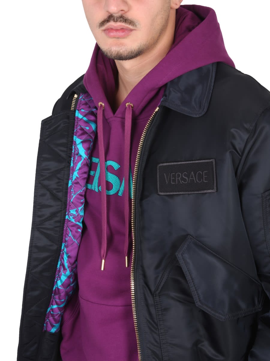 Shop Versace Bomber Jacket With Applied Logo In Black