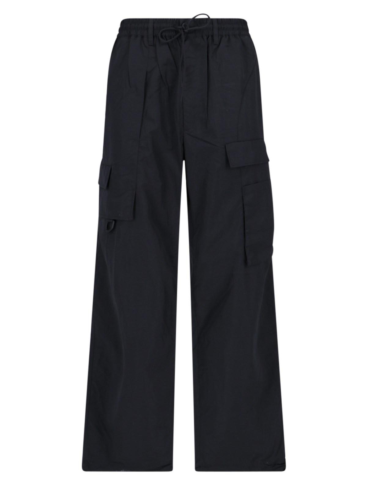 Shop Y-3 Buttoned Cargo Trousers In Black