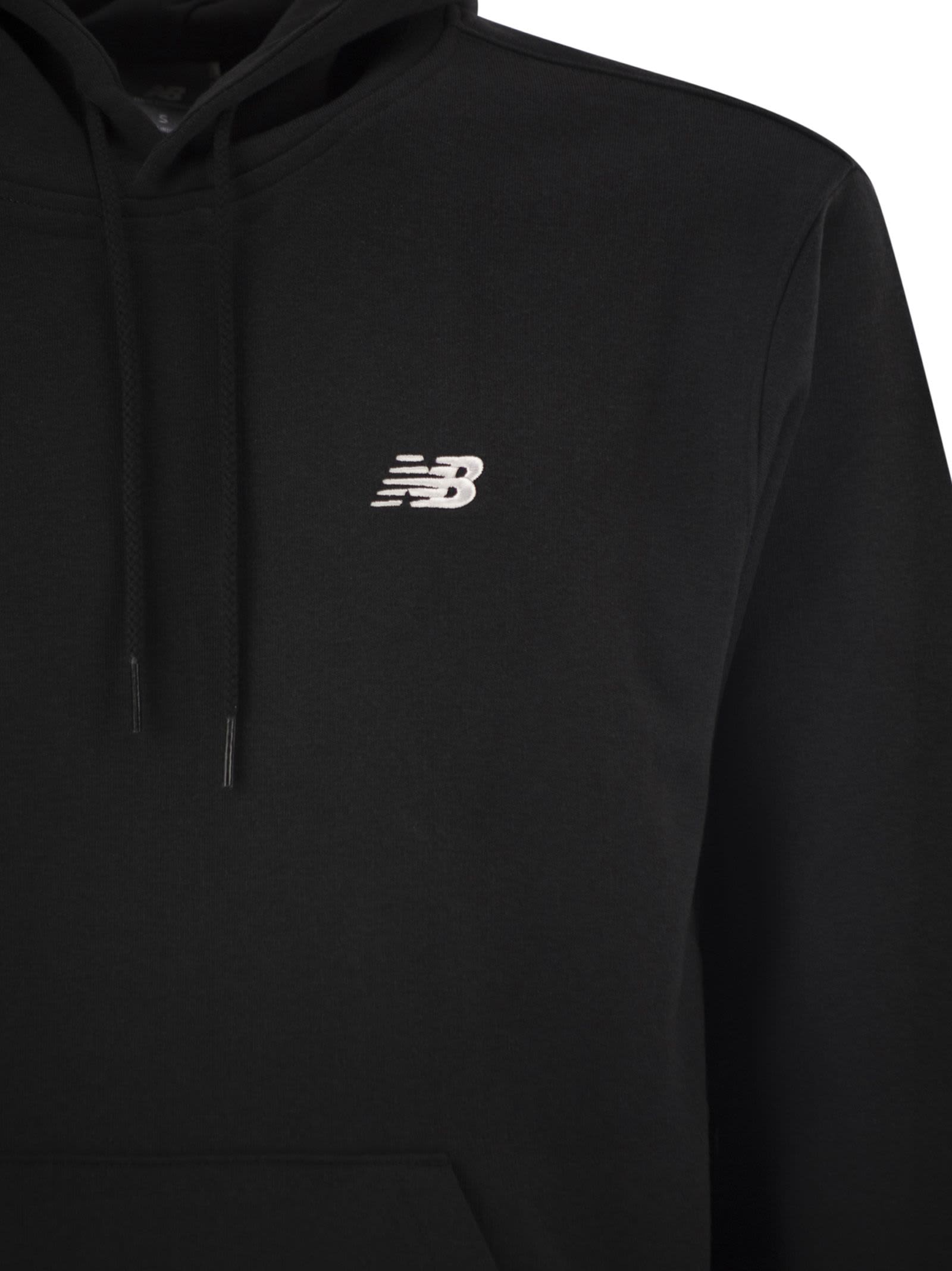 New Balance Sport Essentials Relaxed Fit Fleece Pullover Hoodie In Black