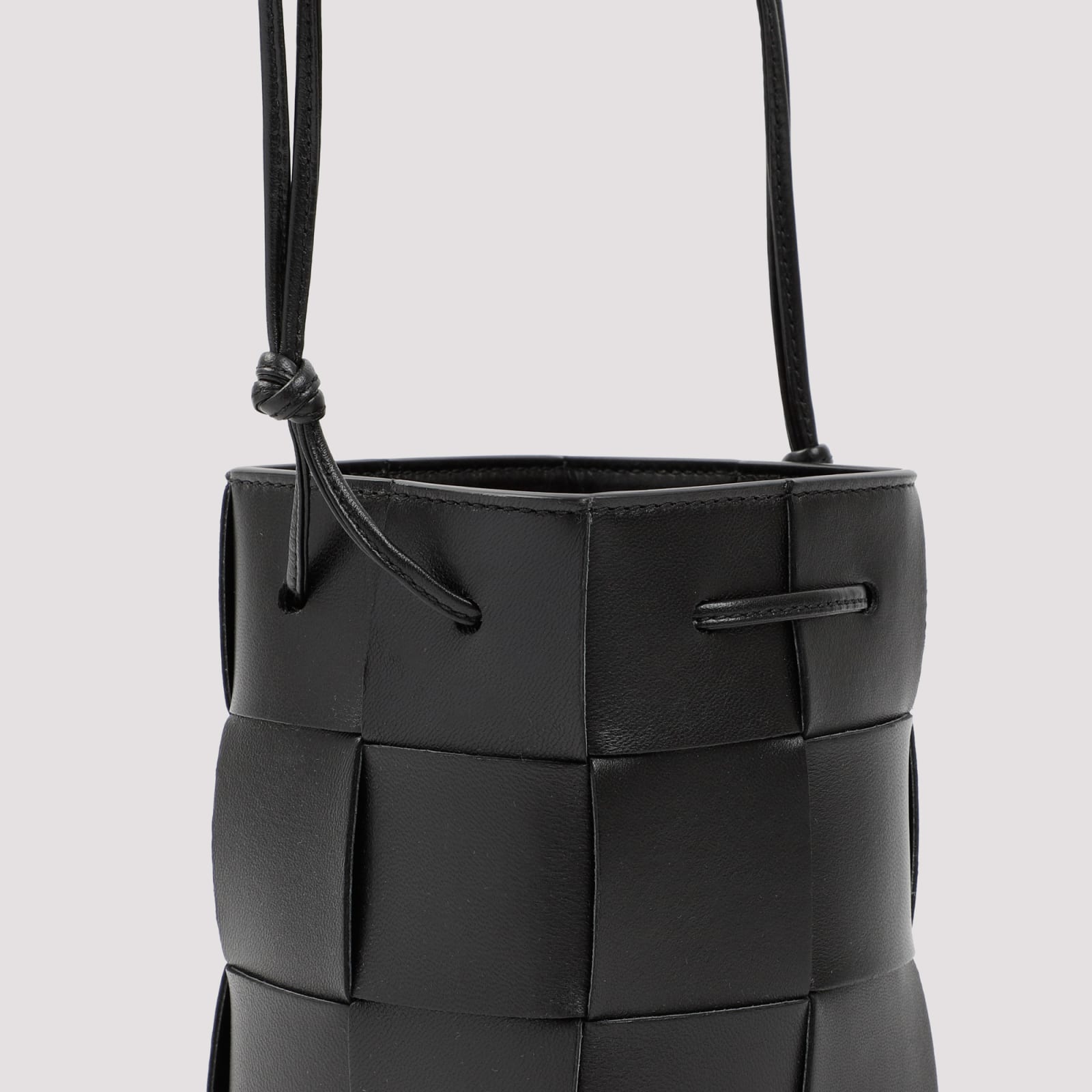 Shop Bottega Veneta Cassette Mini Leather Bucket Bag In Black Gold