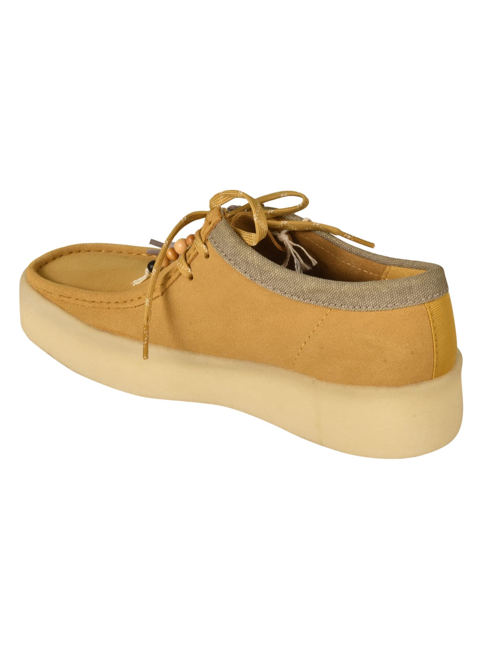 Shop Clarks Wallabee Cup Ankle Boots In Amber