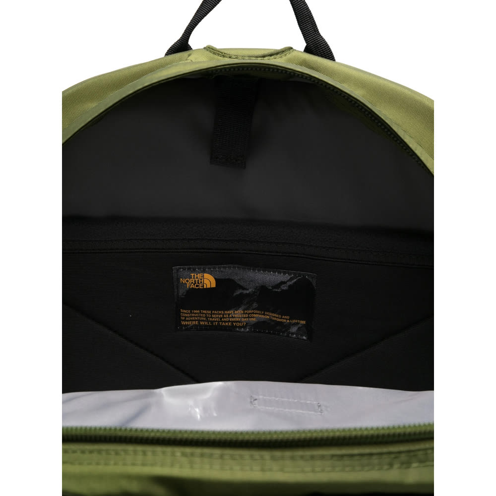 The North Face Backpack With Front Zip Pocket And Bungee Cord System In Green