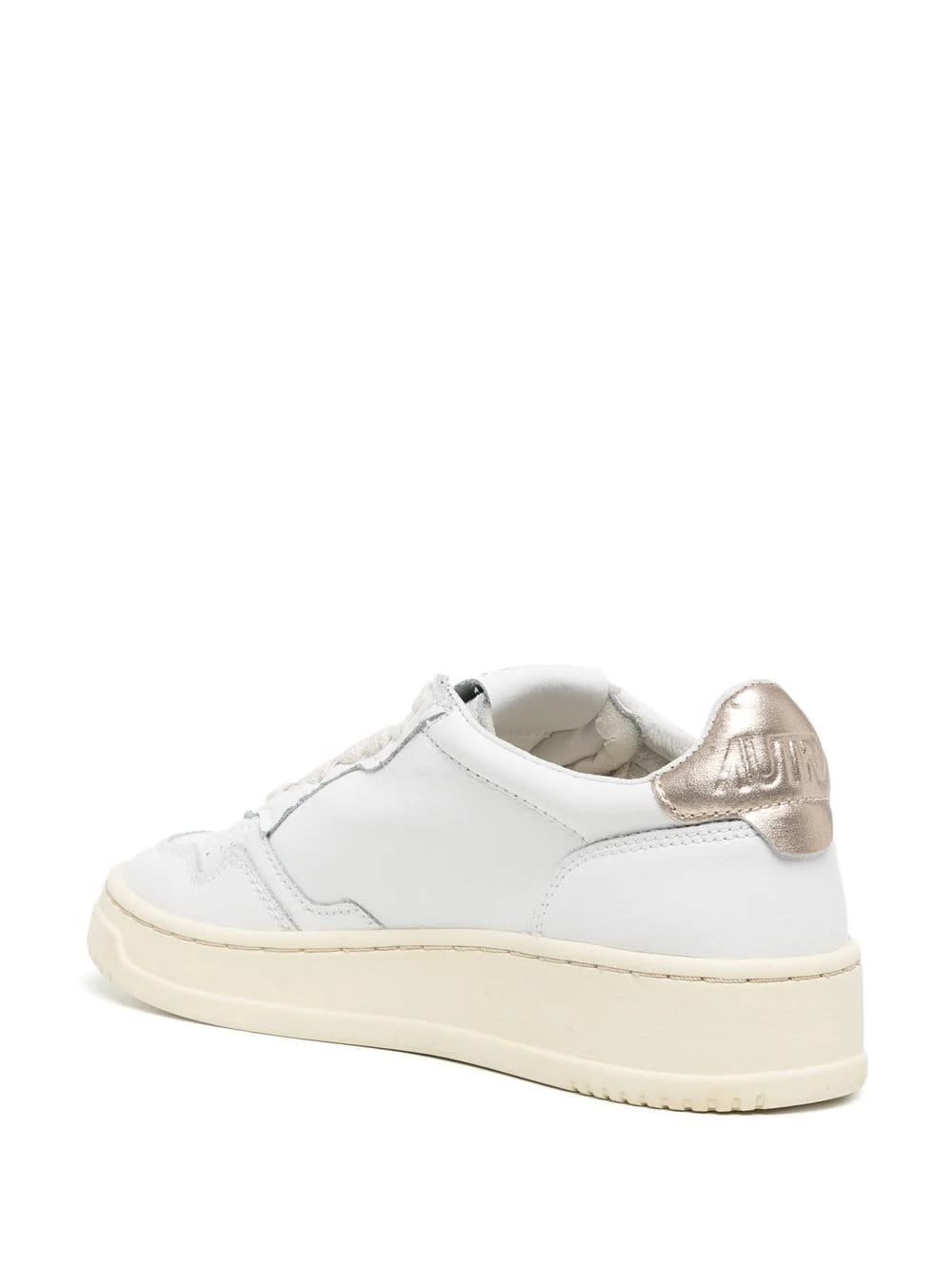 Shop Autry Medalist Low Sneakers In White And Gold Leather