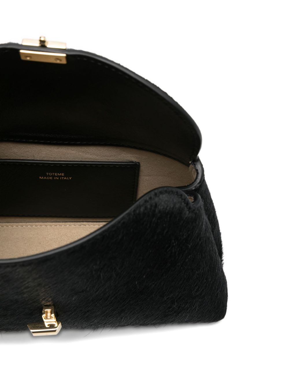 Totême Mini Clutch Bag Curved Silhouette In Black