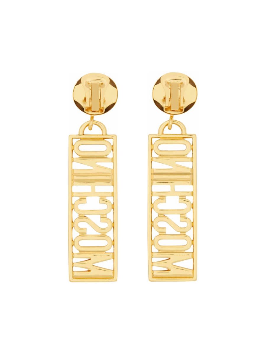 Shop Moschino Logo Earrings In Gold