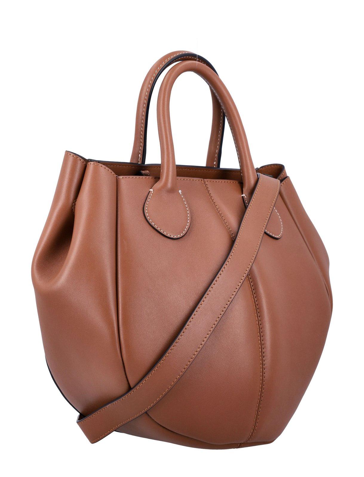 Shop Jw Anderson Small Punch Top Handle Bag In Brown