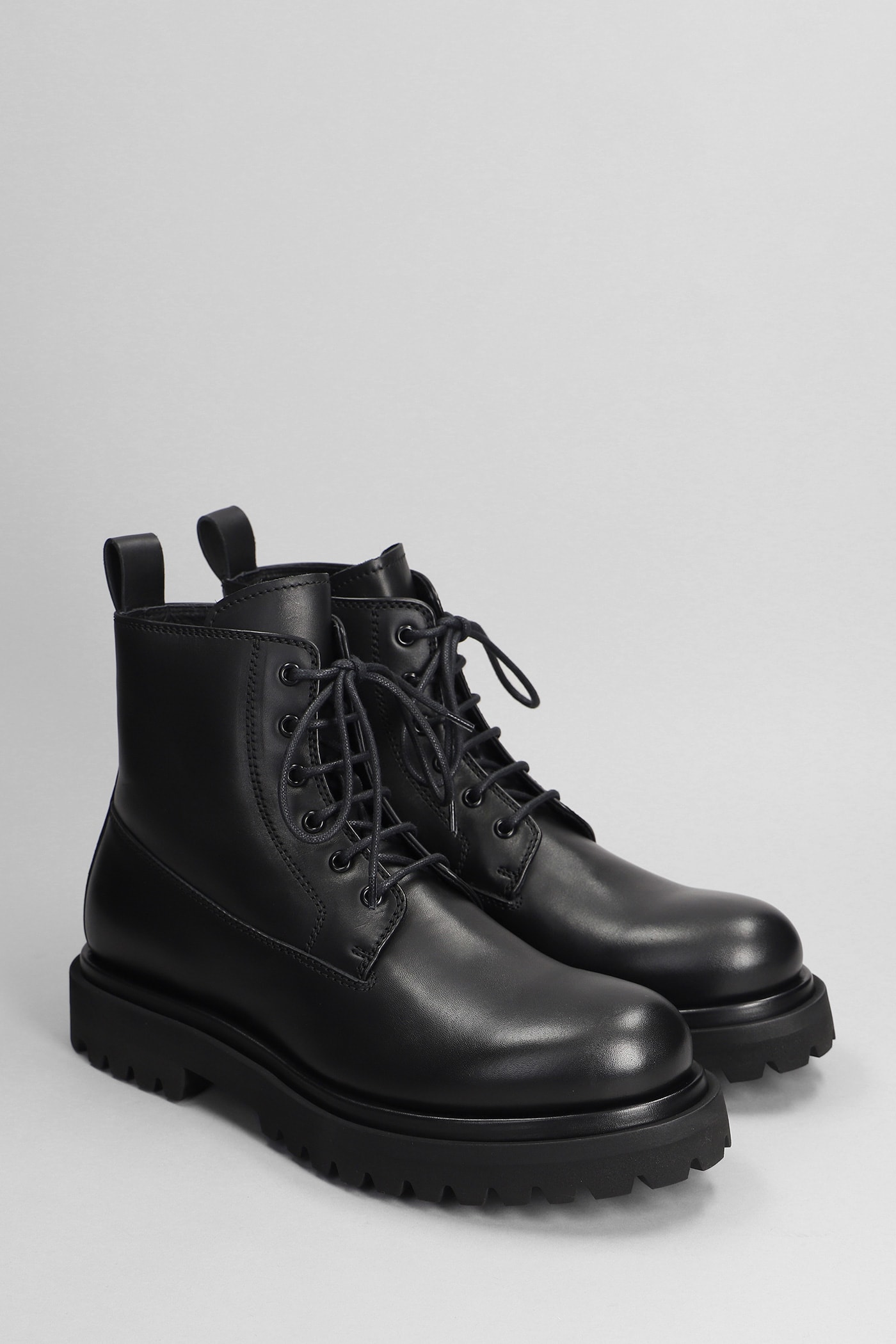 OFFICINE CREATIVE EVENTUAL 020 COMBAT BOOTS IN BLACK LEATHER 