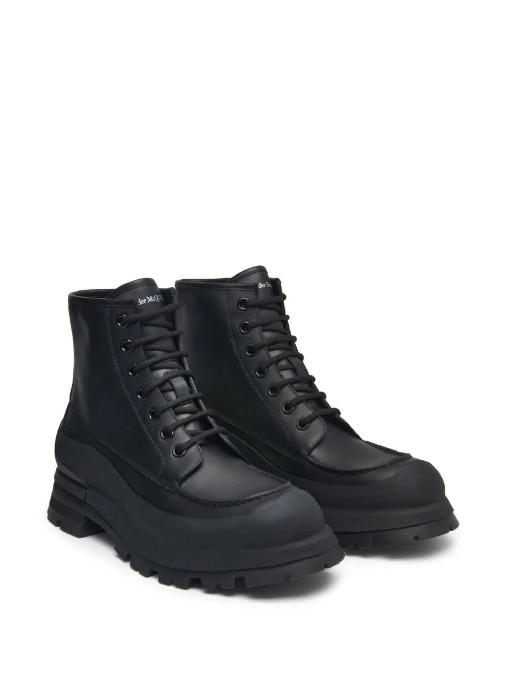 Shop Alexander Mcqueen Wander Ankle Boots In Black Leather