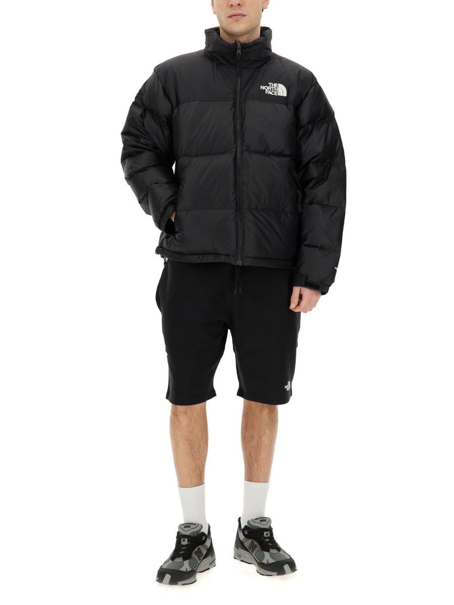 Shop The North Face 1996 Nylon Down Jacket In Black