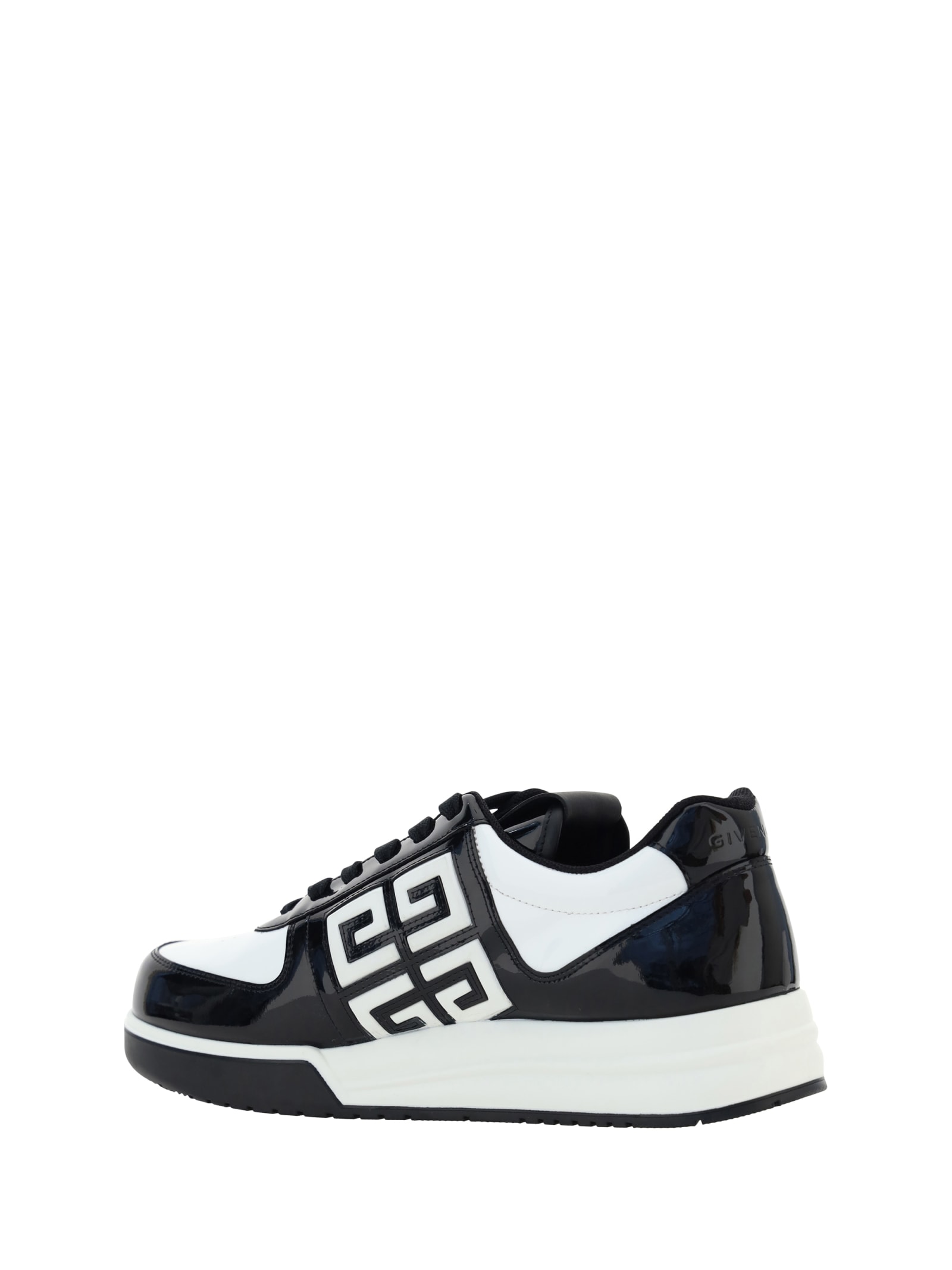 Shop Givenchy G4 Low Top Sneakers In Black/white