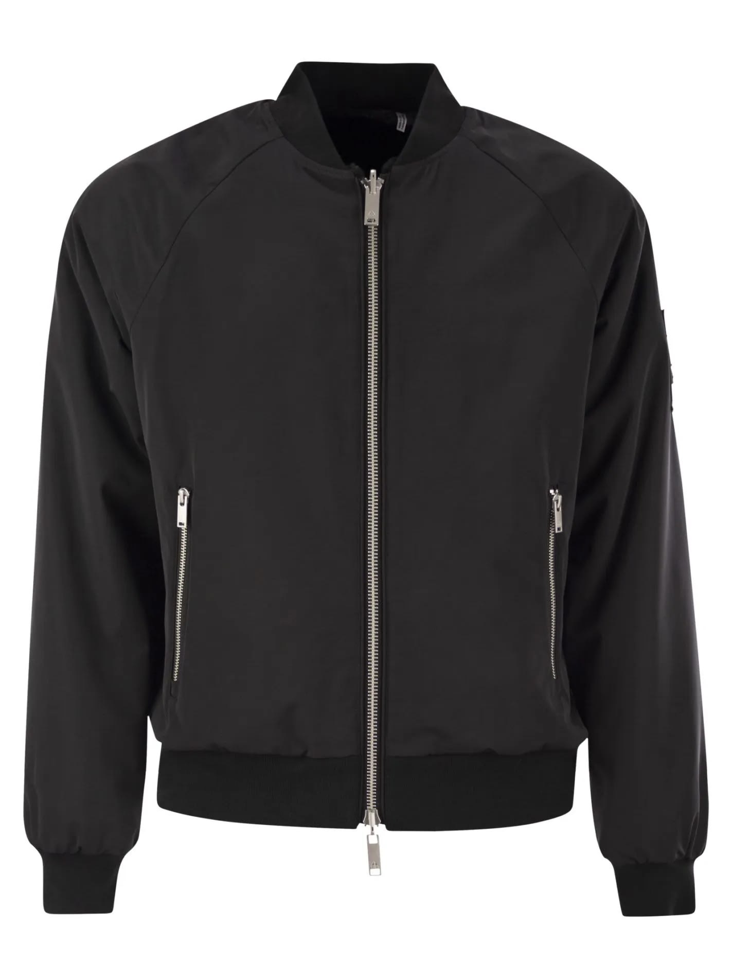 Shop Moose Knuckles Bunny Rev Bomber In Black.black