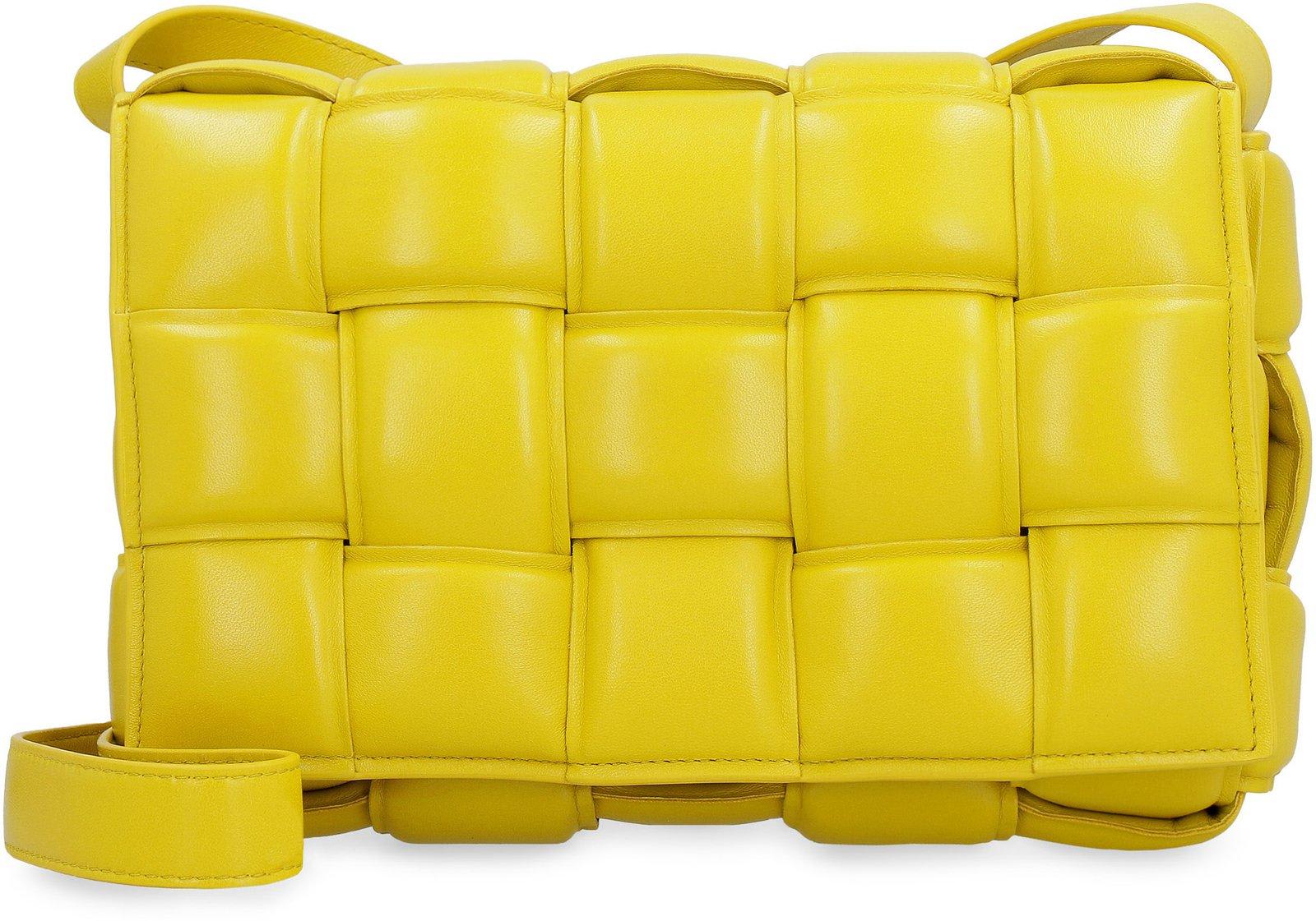 Shop Bottega Veneta Padded Cassette Shoulder Bag In Yellow