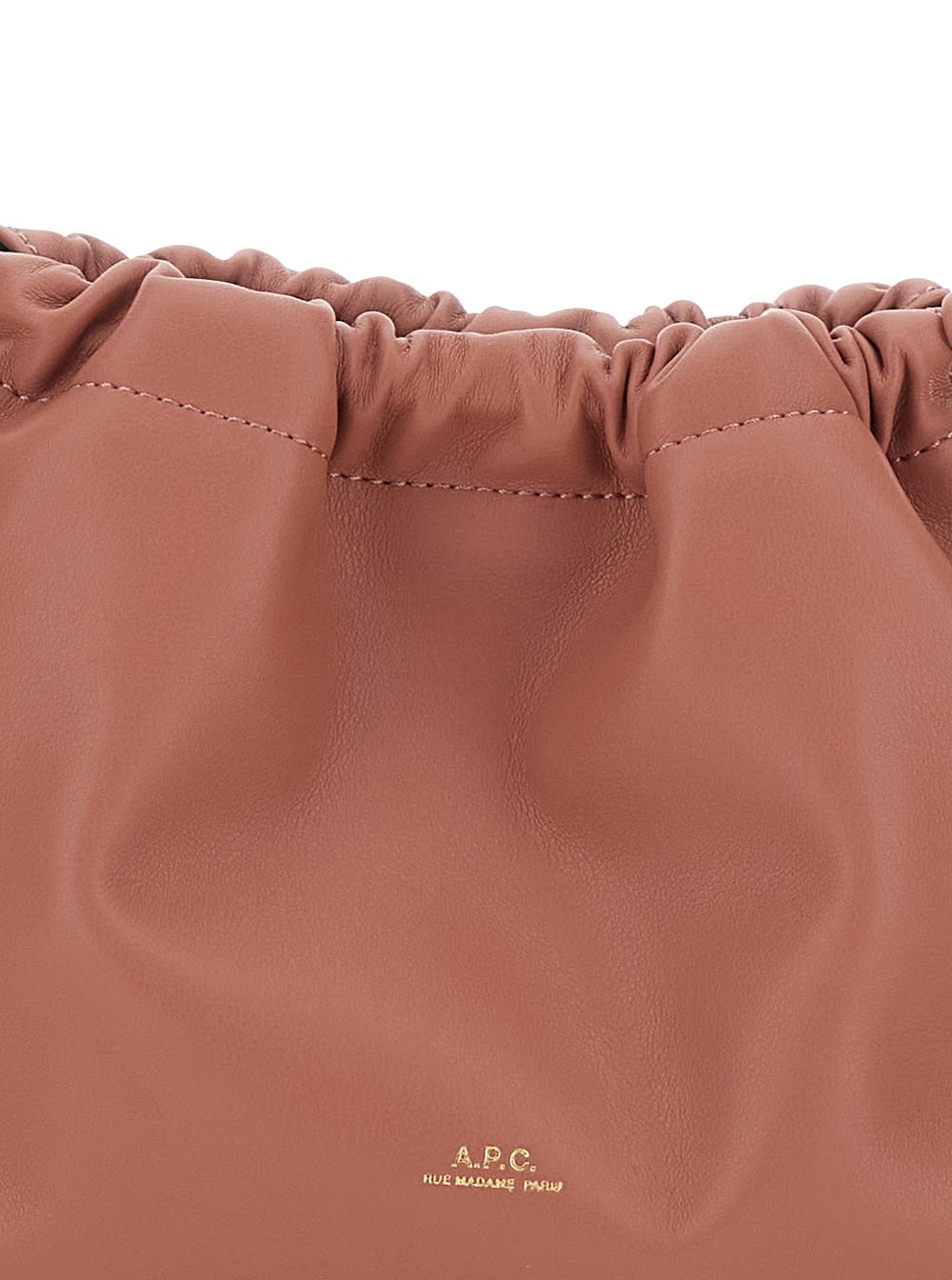 APC NINON MINI PINK CROSSBODY BAG WITH EMBOSSED LOGO ON THE FRONT AND ADJUSTABLE SHOULDER STRAP IN ECOLE
