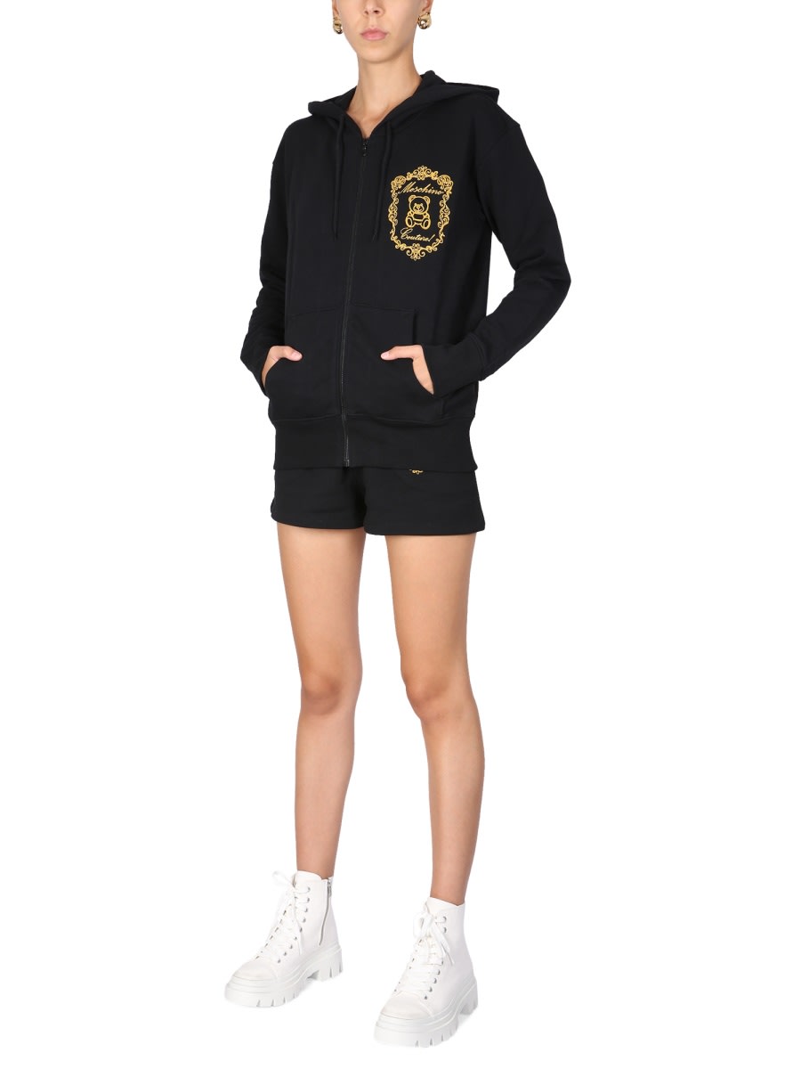 Shop Moschino Sweatshirt With Logo Print In Black