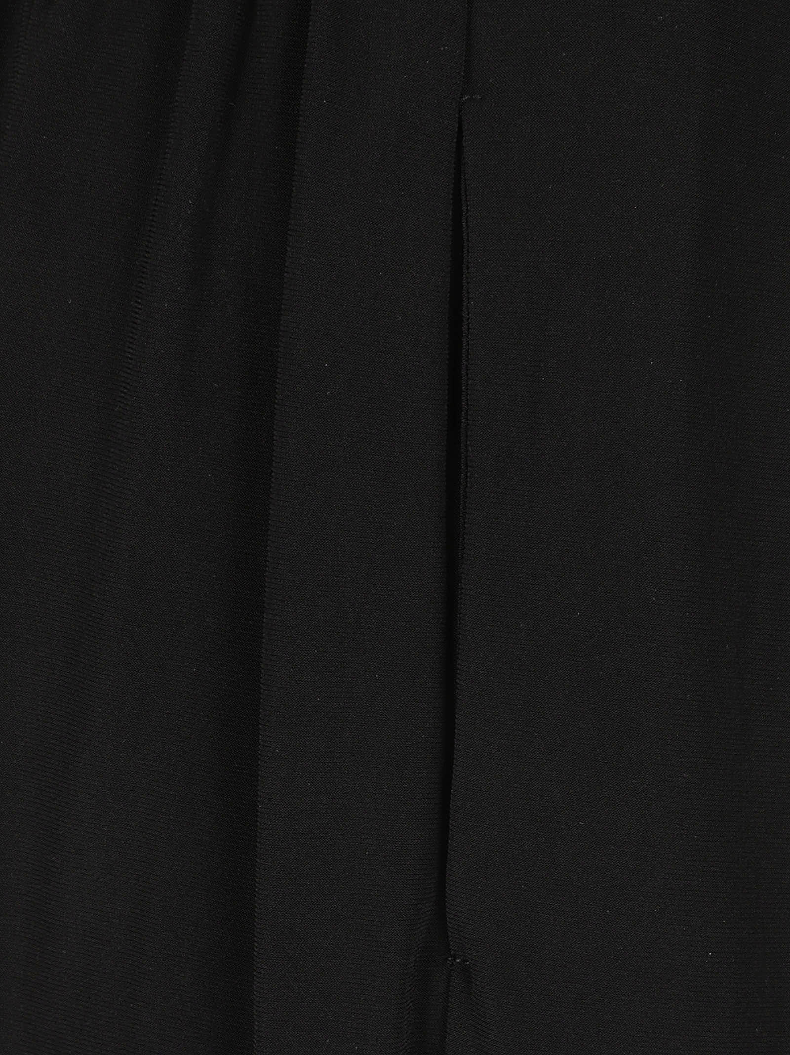 Shop Norma Kamali Trousers Black