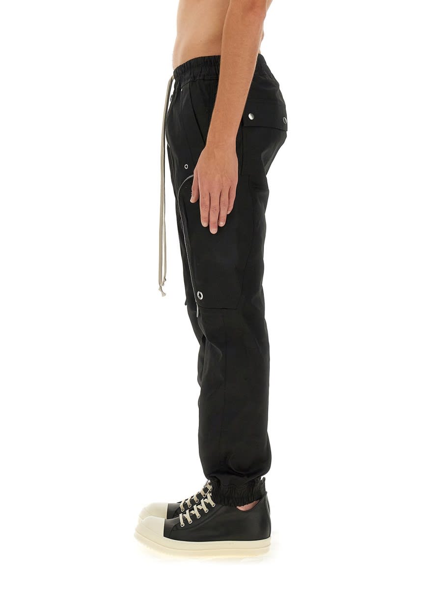 Shop Rick Owens Zip Pocket Laced Trousers In Black