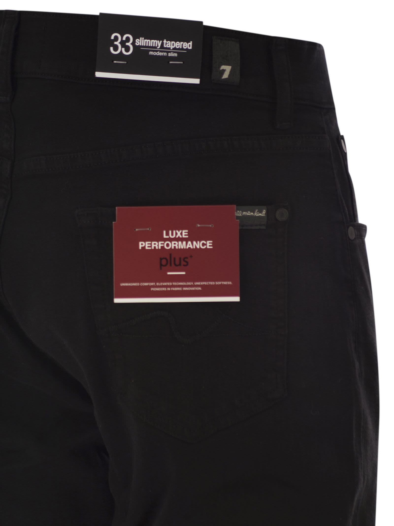 7 For All Mankind Slimmy Tapered Skinny Medium Waisted Jeans In Black