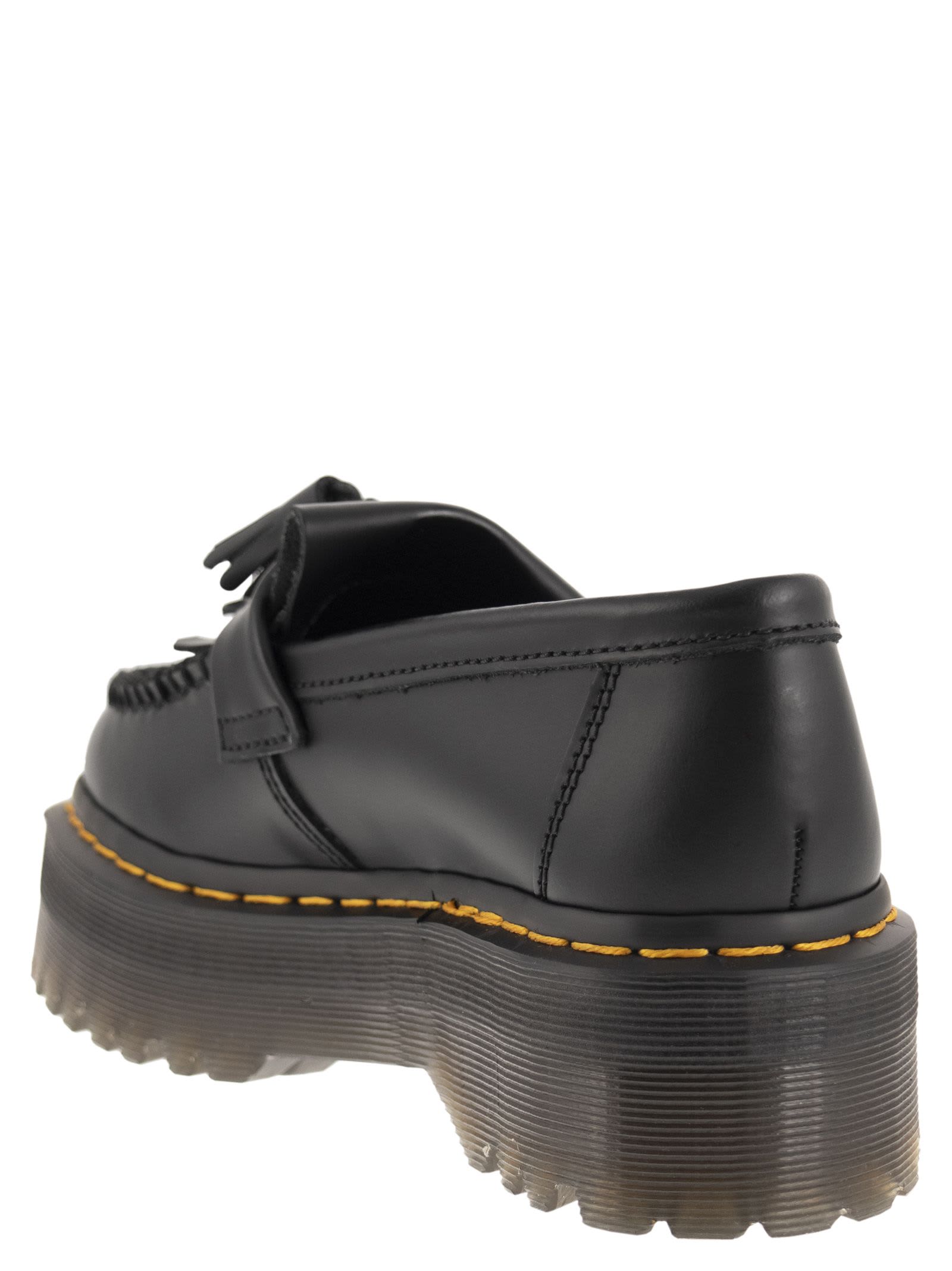 Shop Dr. Martens' Adrian Quad Moccasin With Kiltie Fringes In Black Smooth