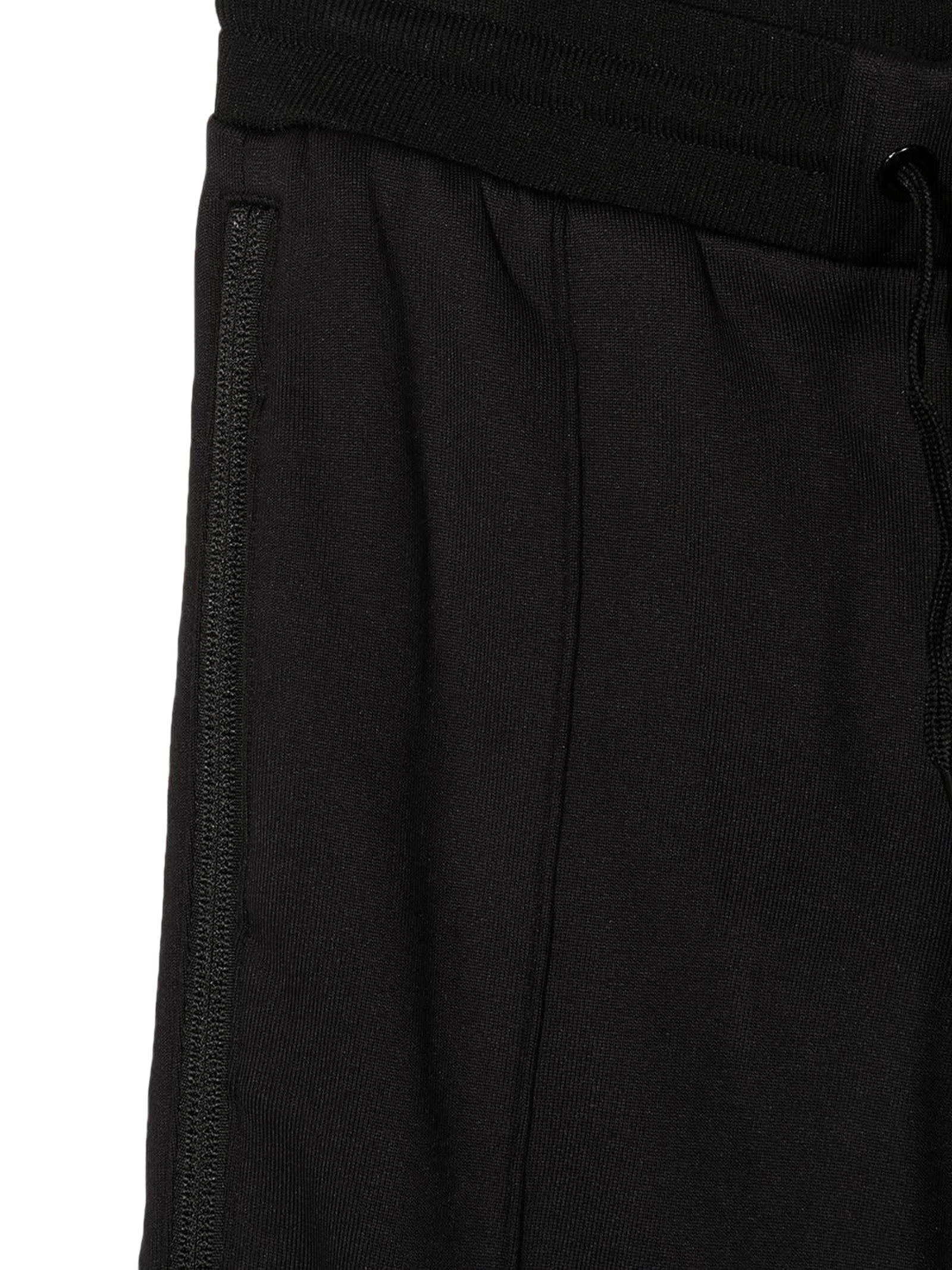 Shop Givenchy Black Cotton Blend Trousers In Nero