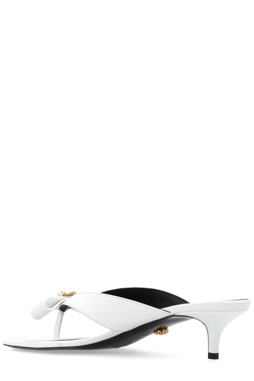 Shop Versace Gianni Bow-detailed Sandals
