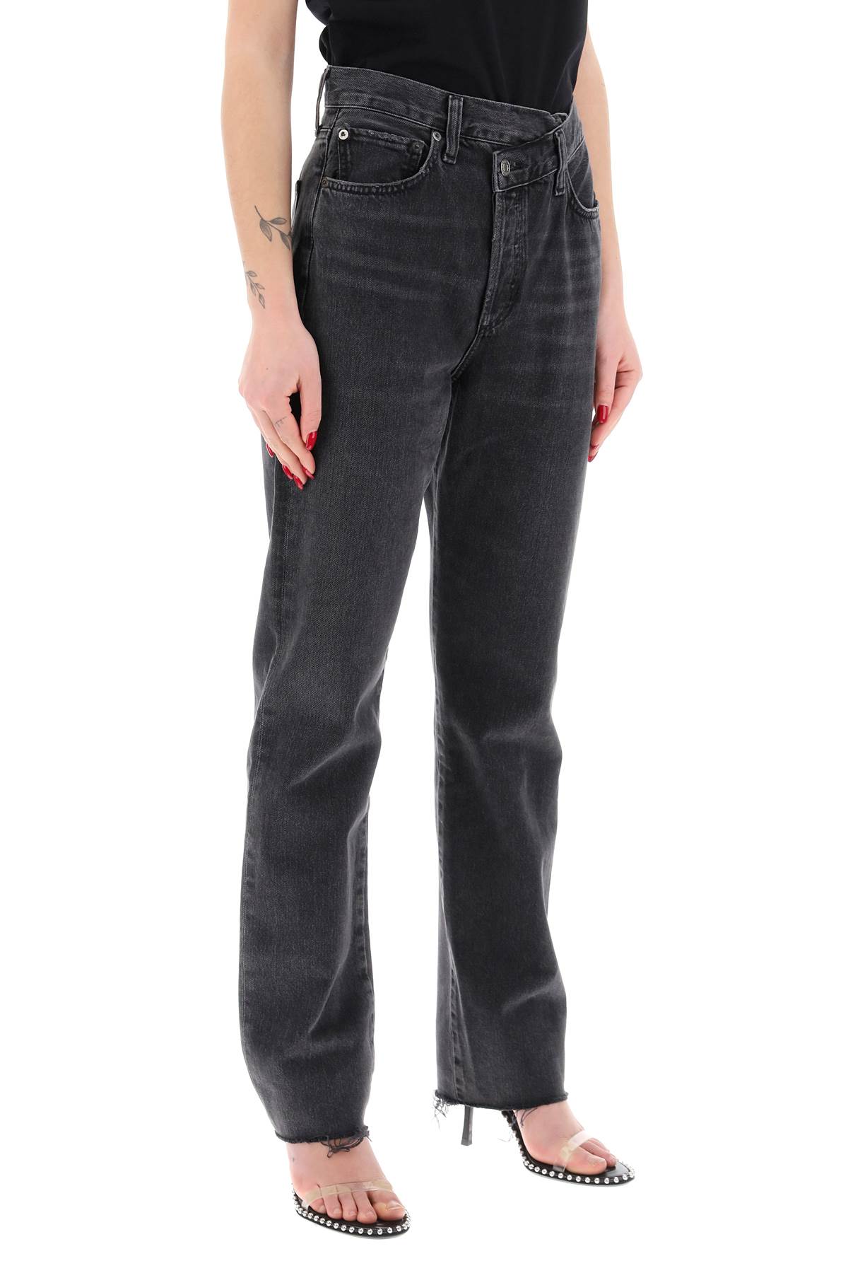 Shop Agolde Offset Waistband Jeans In Shambles (black)