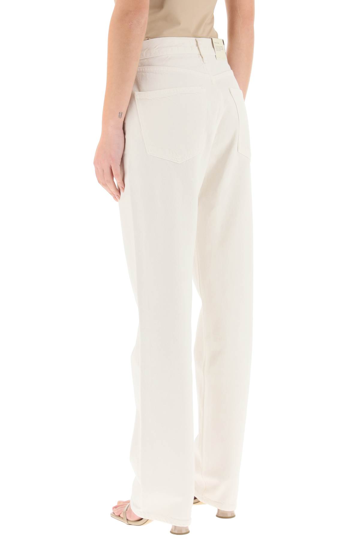Shop Agolde Lana Straight Mid Rise Jeans In Drum (white)