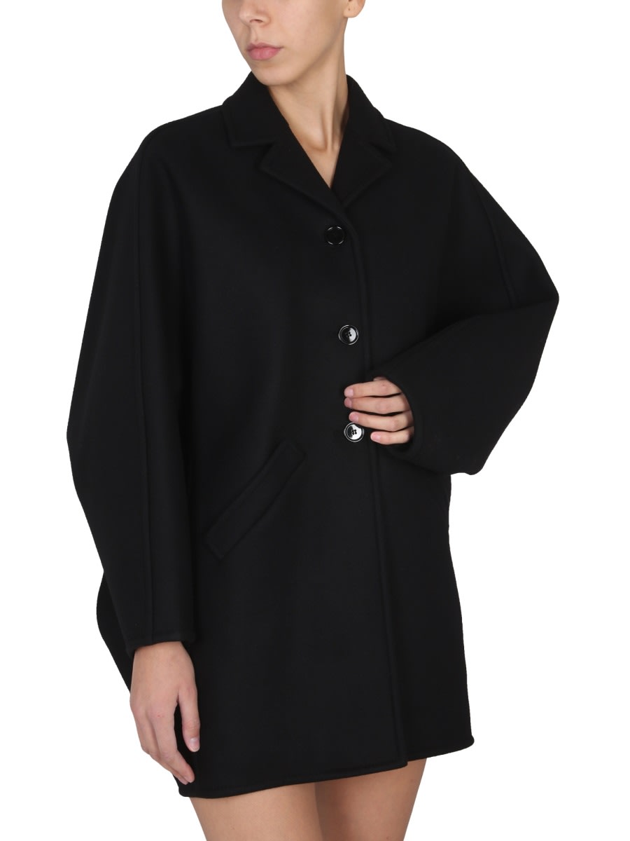 Shop Courrèges Short Coat In Black