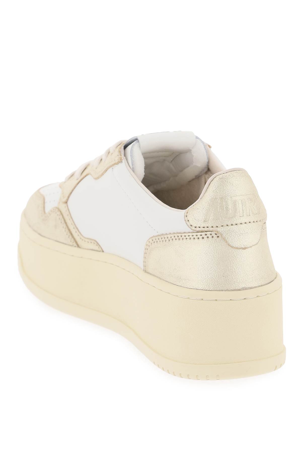 Shop Autry Medalist Low Sneakers In White Platinum (white)