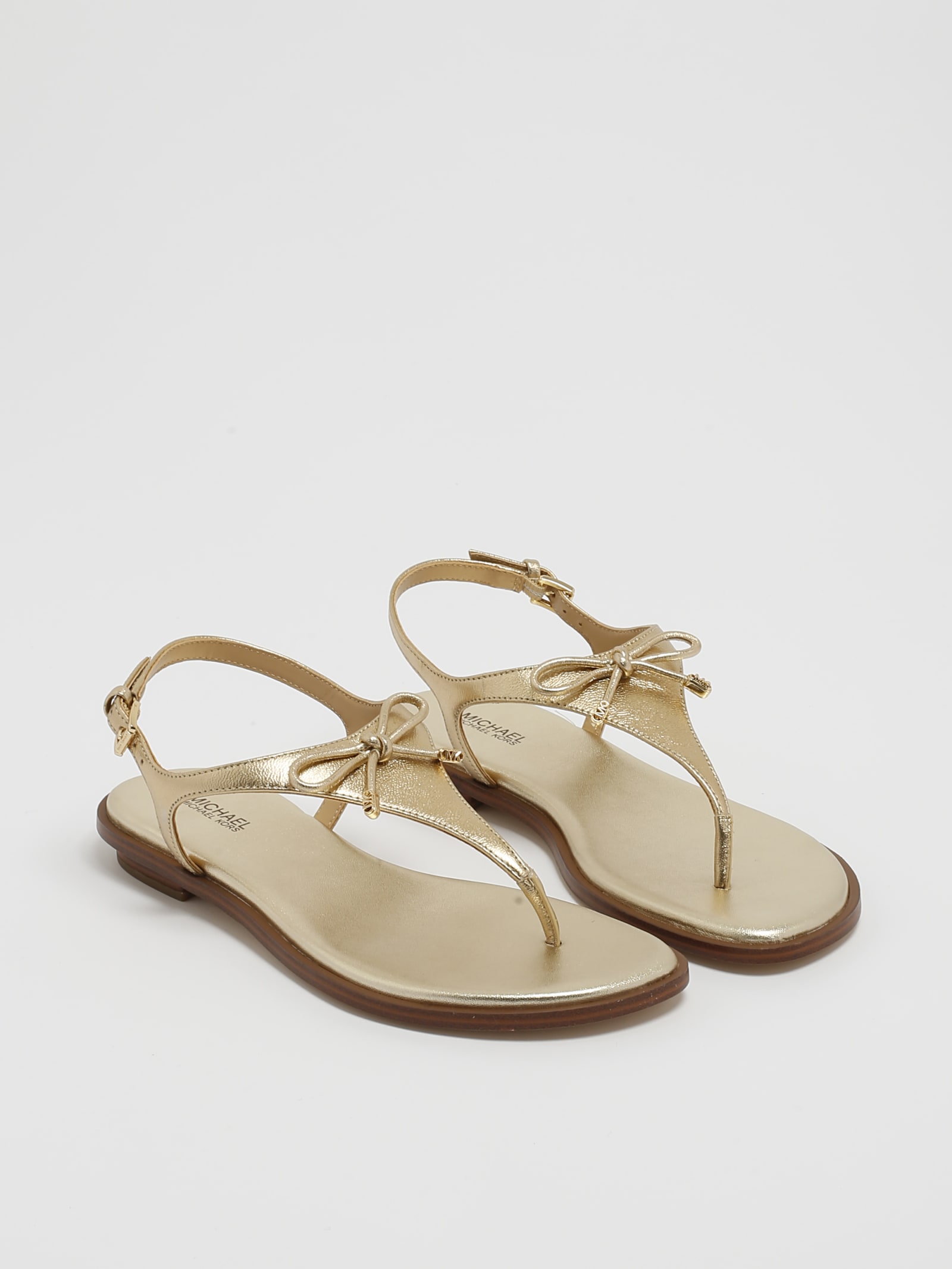 Shop Michael Kors Nori Flat Thong Sandal In Oro