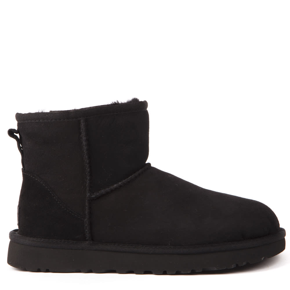 Buy UGG Mini Classic Boots In Reversed Sheepskin online, shop UGG shoes with free shipping