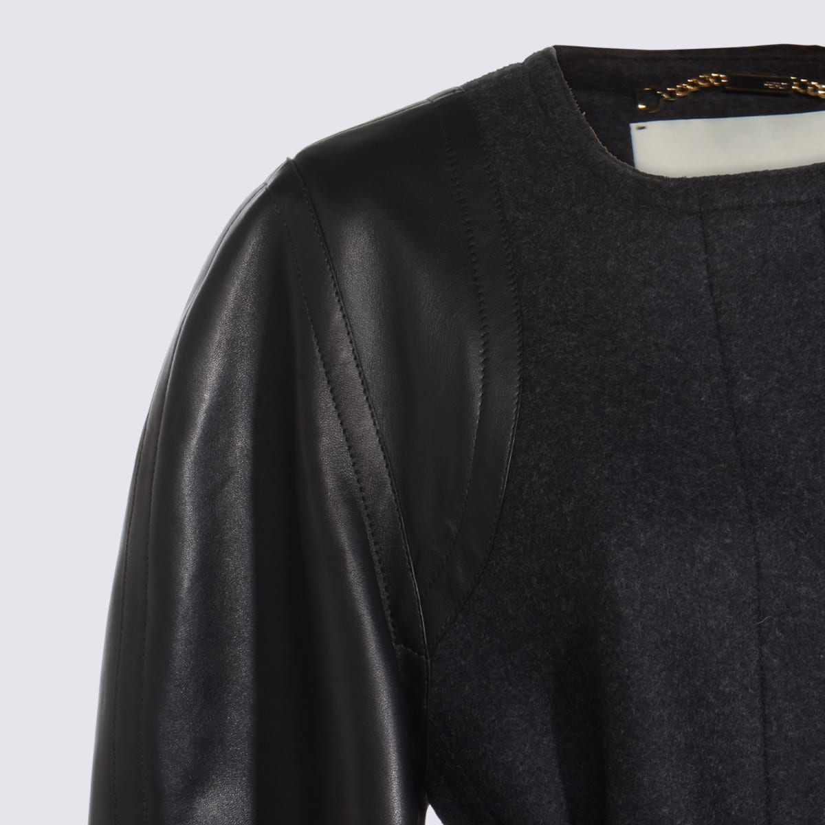 Fendi Women Virgin Wool Coat With Leather Sleeves In Black
