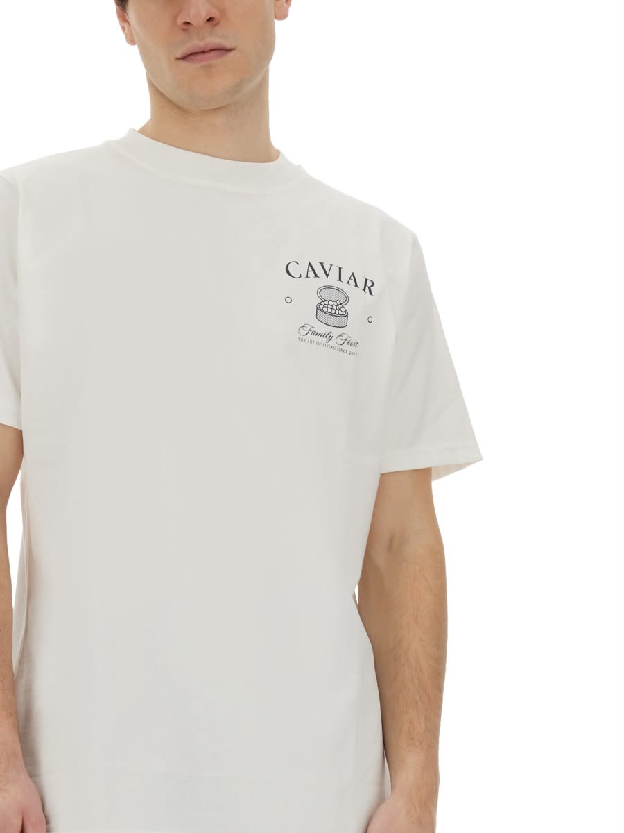 Shop Family First Milano T-shirt With Caviar Print In White