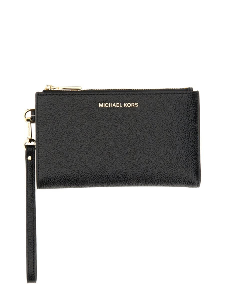 Shop Michael Kors Jet Set Wallet In Black