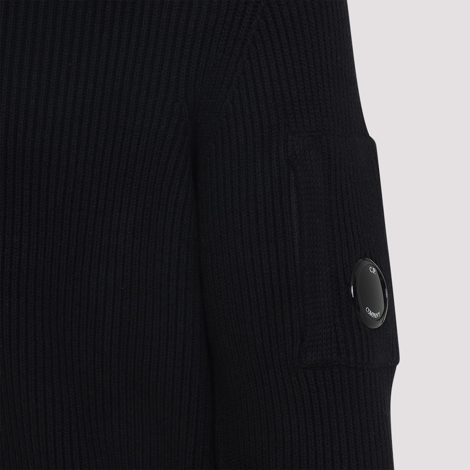 C.p. Company C.p.company Ribbed Sweater With Lens Pocket In Black