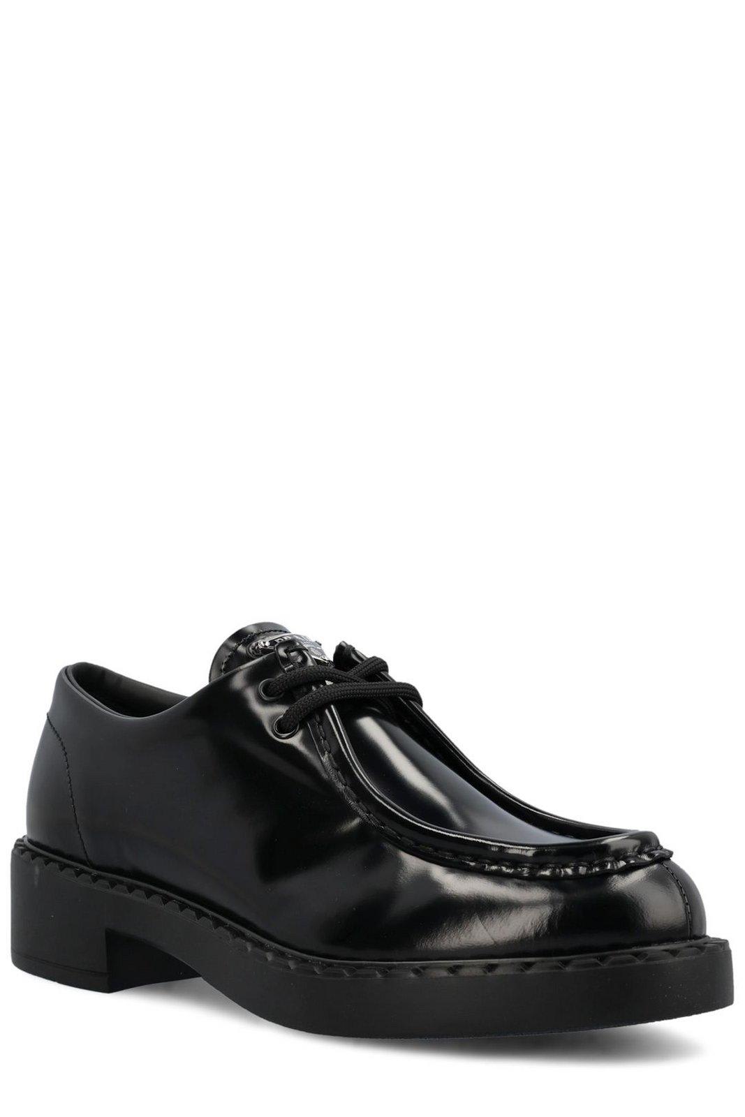 Shop Prada Triangle Logo Plaque Lace-up Shoes In Nero