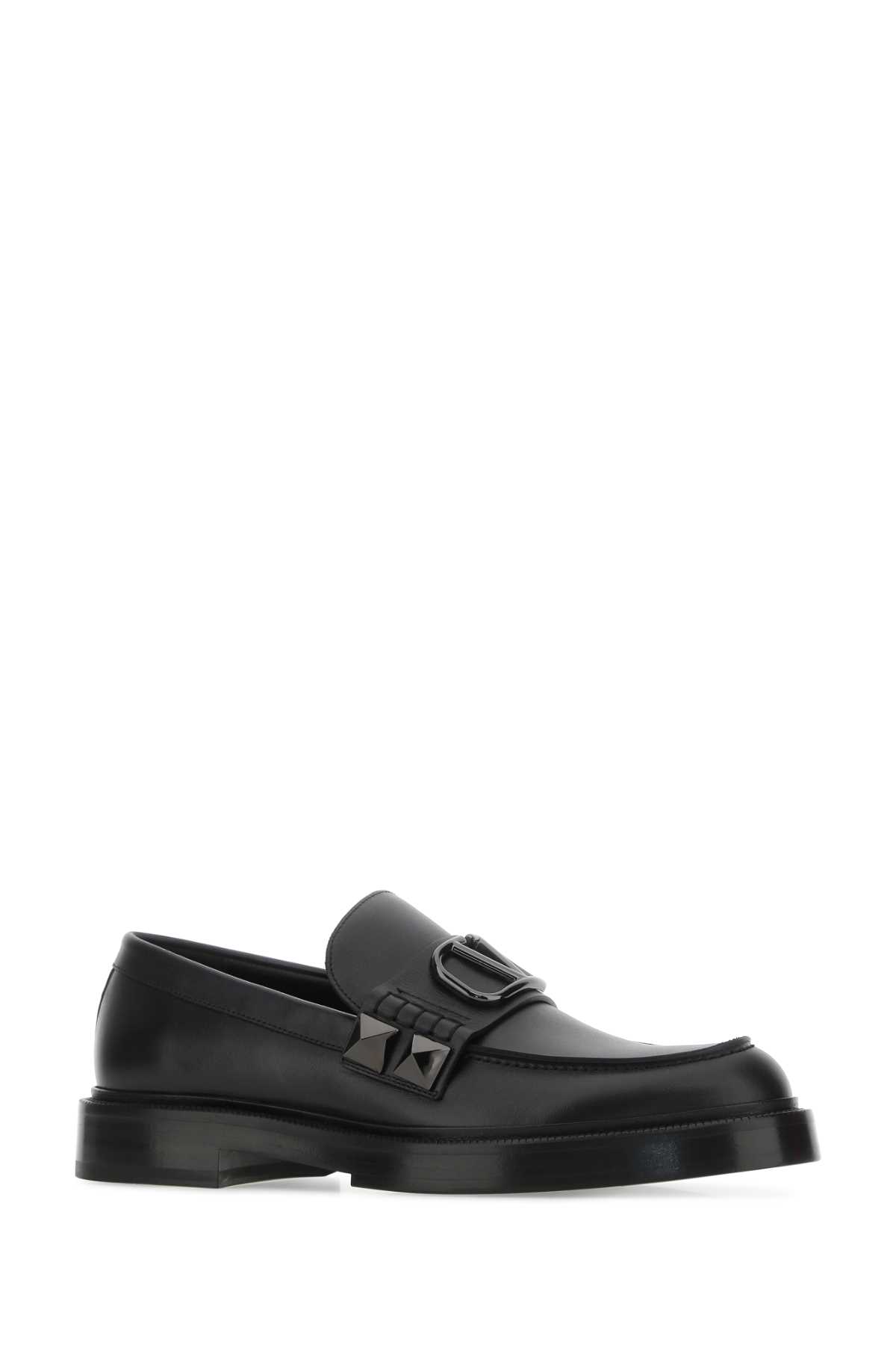 Shop Valentino Black Leather Stud Sign Loafers In Nero