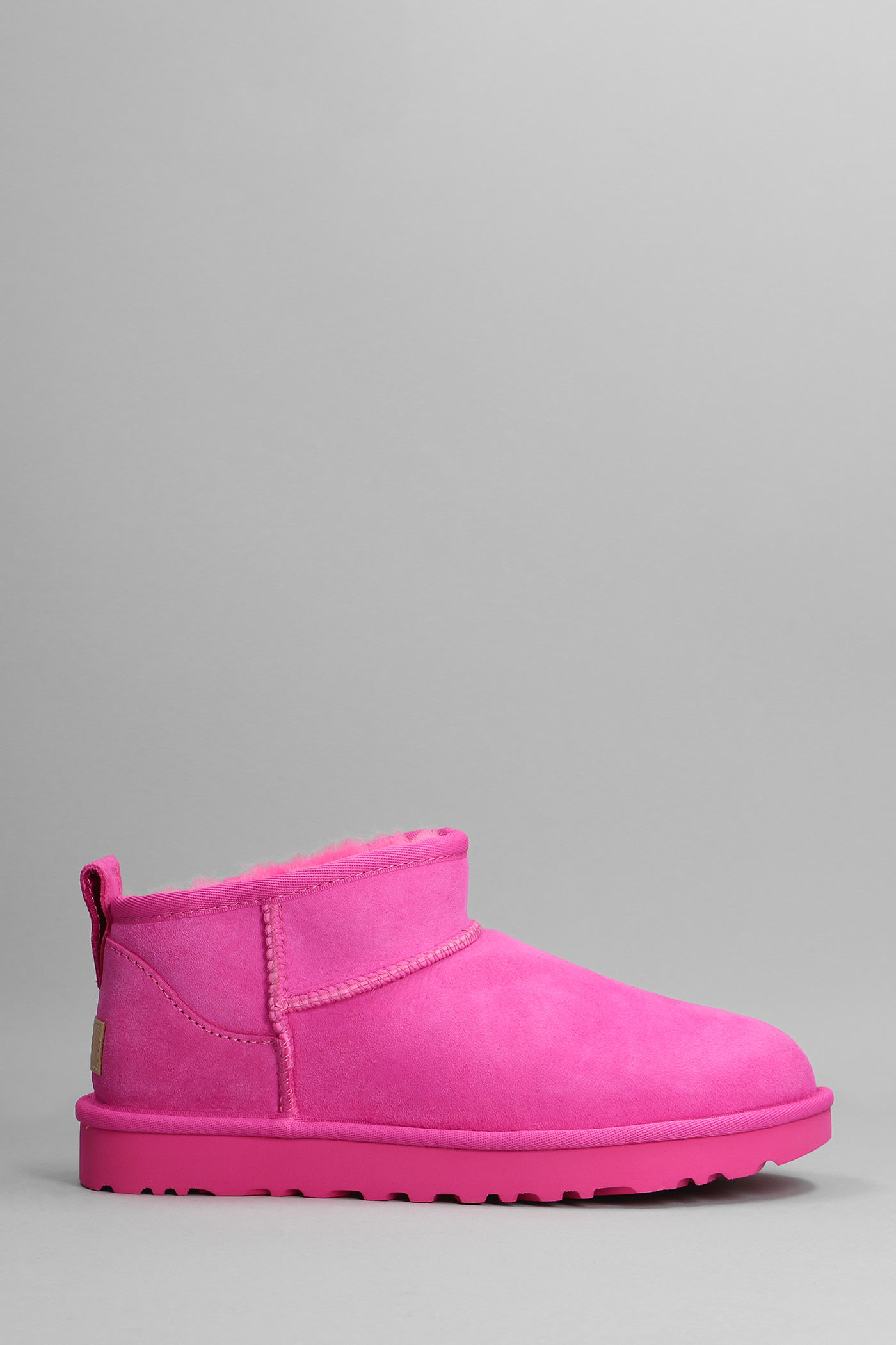 UGG CLASSIC ULTRA MINI LOW HEELS ANKLE BOOTS IN FUXIA SUEDE
