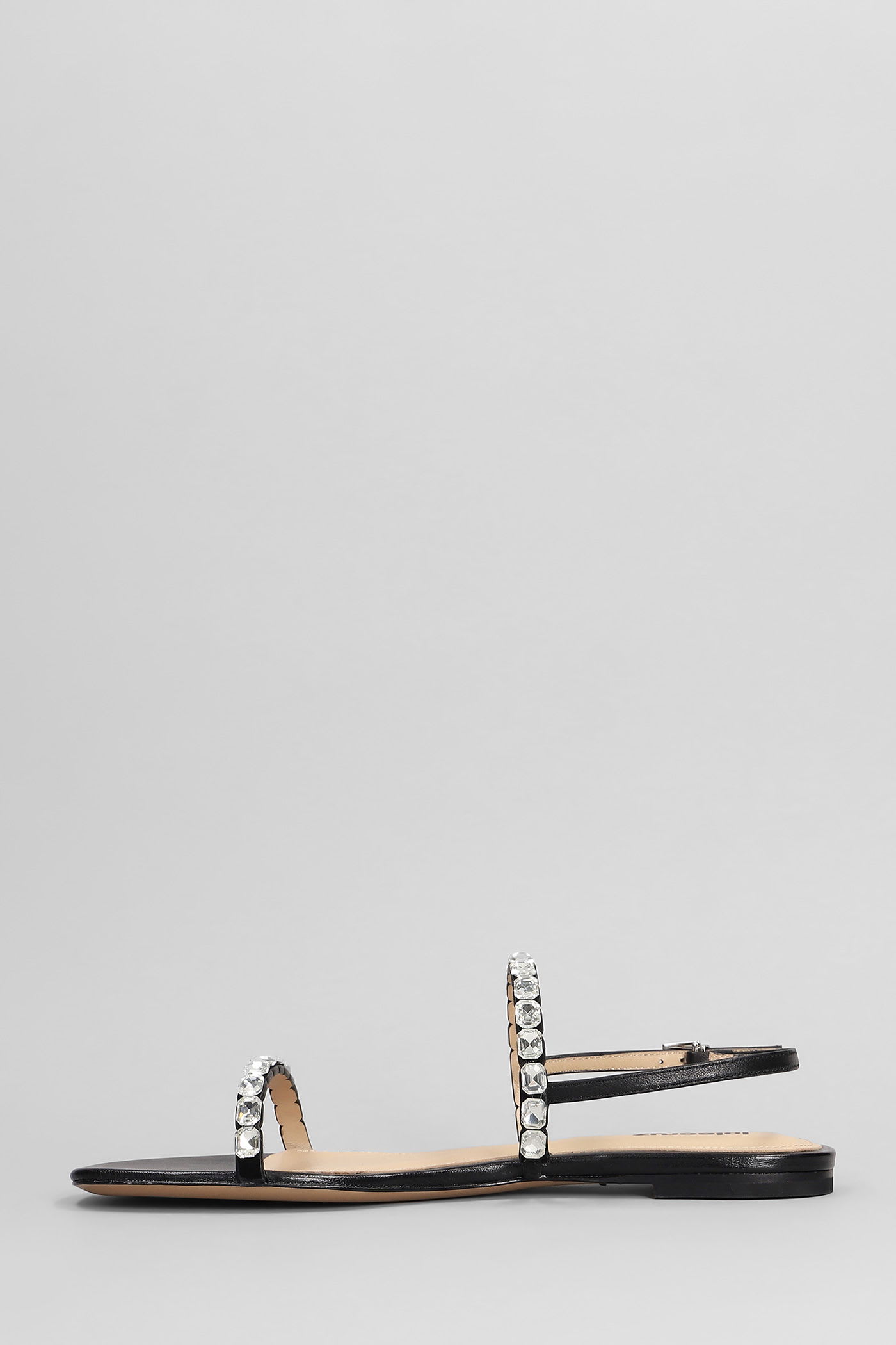 Lola Cruz Flats In Black Leather In Black