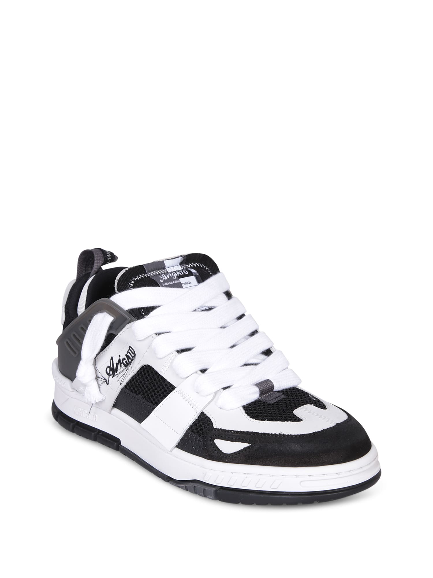 Shop Axel Arigato Area Patchwork Black/white Sneakers