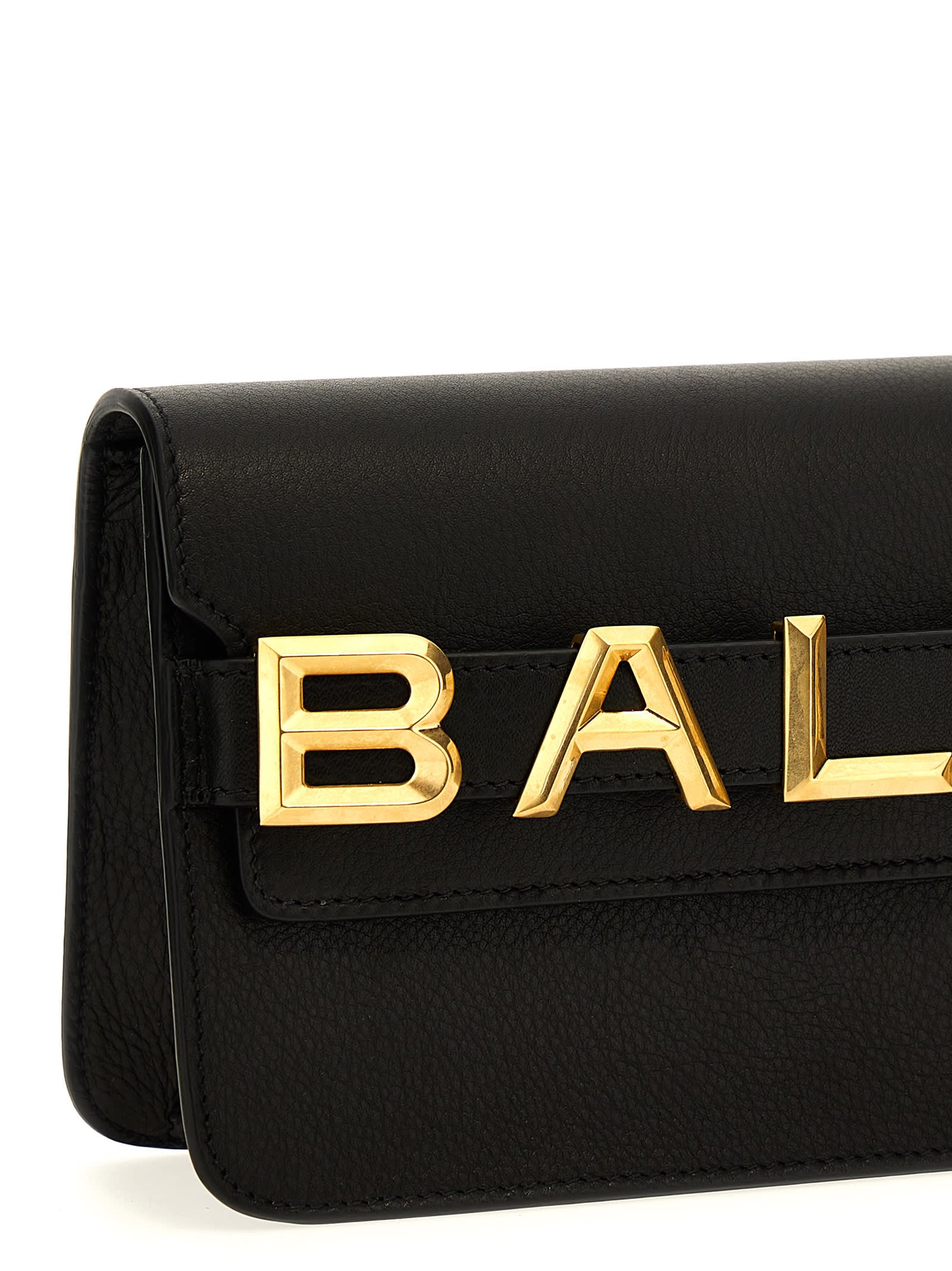 Shop Bally Logo Crossbody Bag In Black+oro