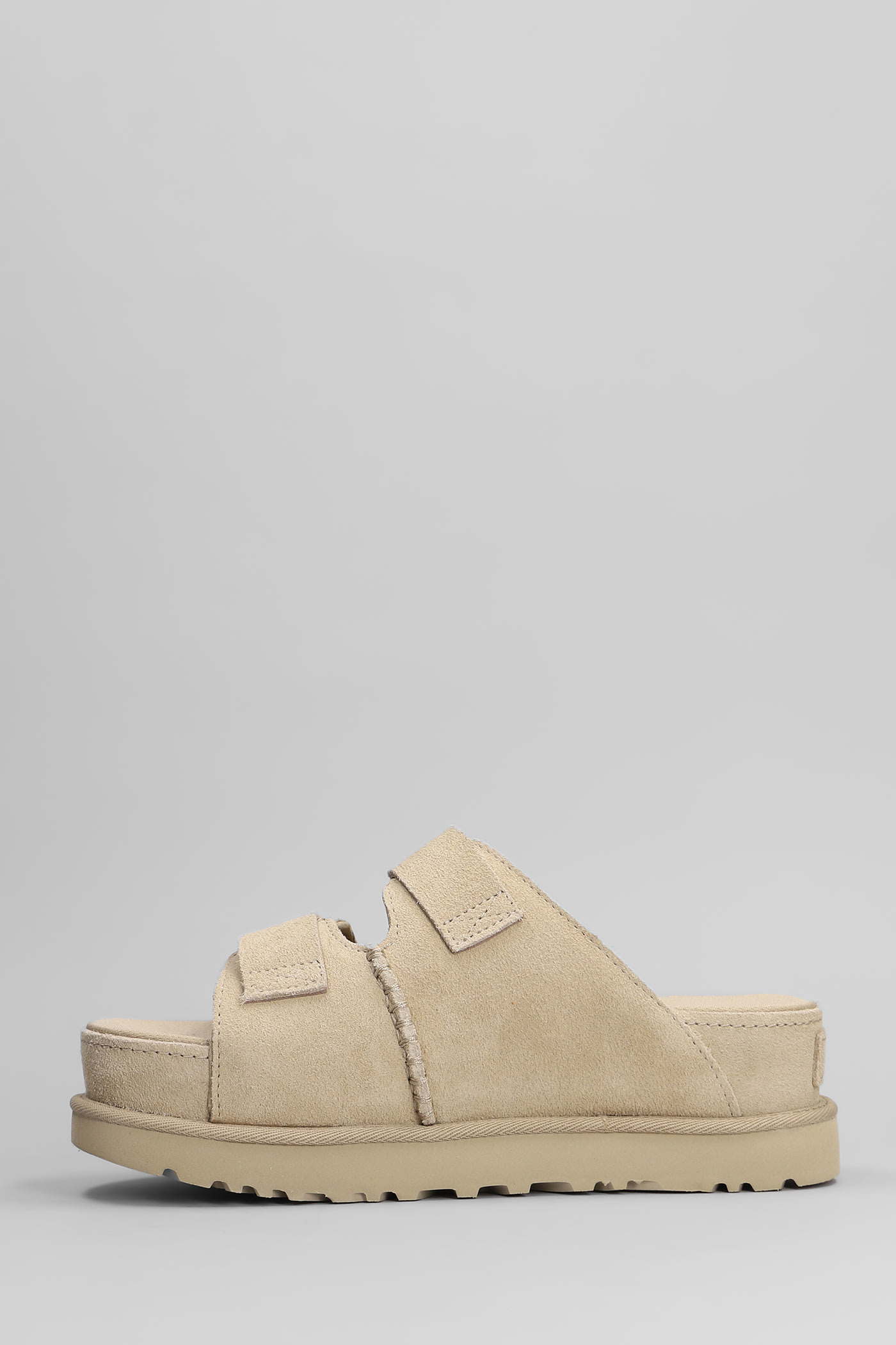 UGG GOLDENSTAR HI SLIPPER-MULE IN BEIGE SUEDE