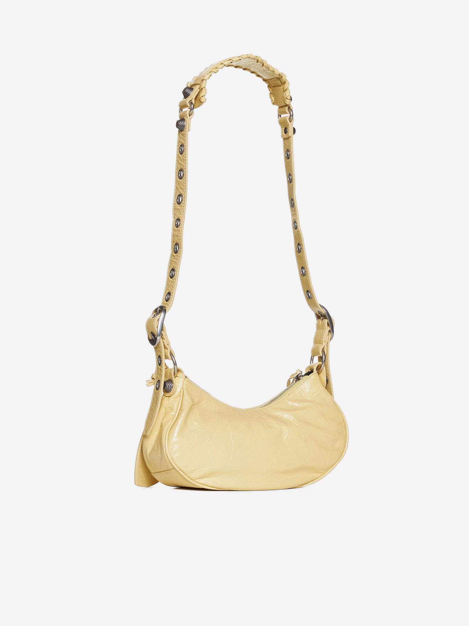 Shop Balenciaga Le Cagole Xs Leather Bag In Yellow