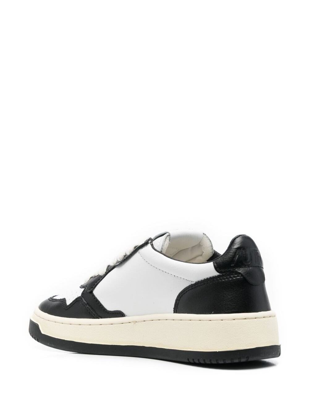 Shop Autry Medalist White And Black Low Top Sneakers With Logo Patch In Leather Woman