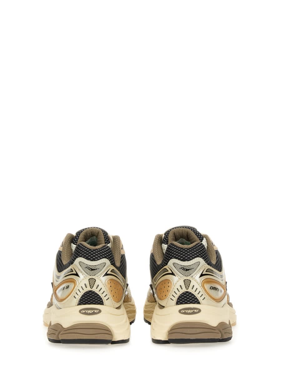 Saucony Progrid Omni 9 Running Sneakers In Gold