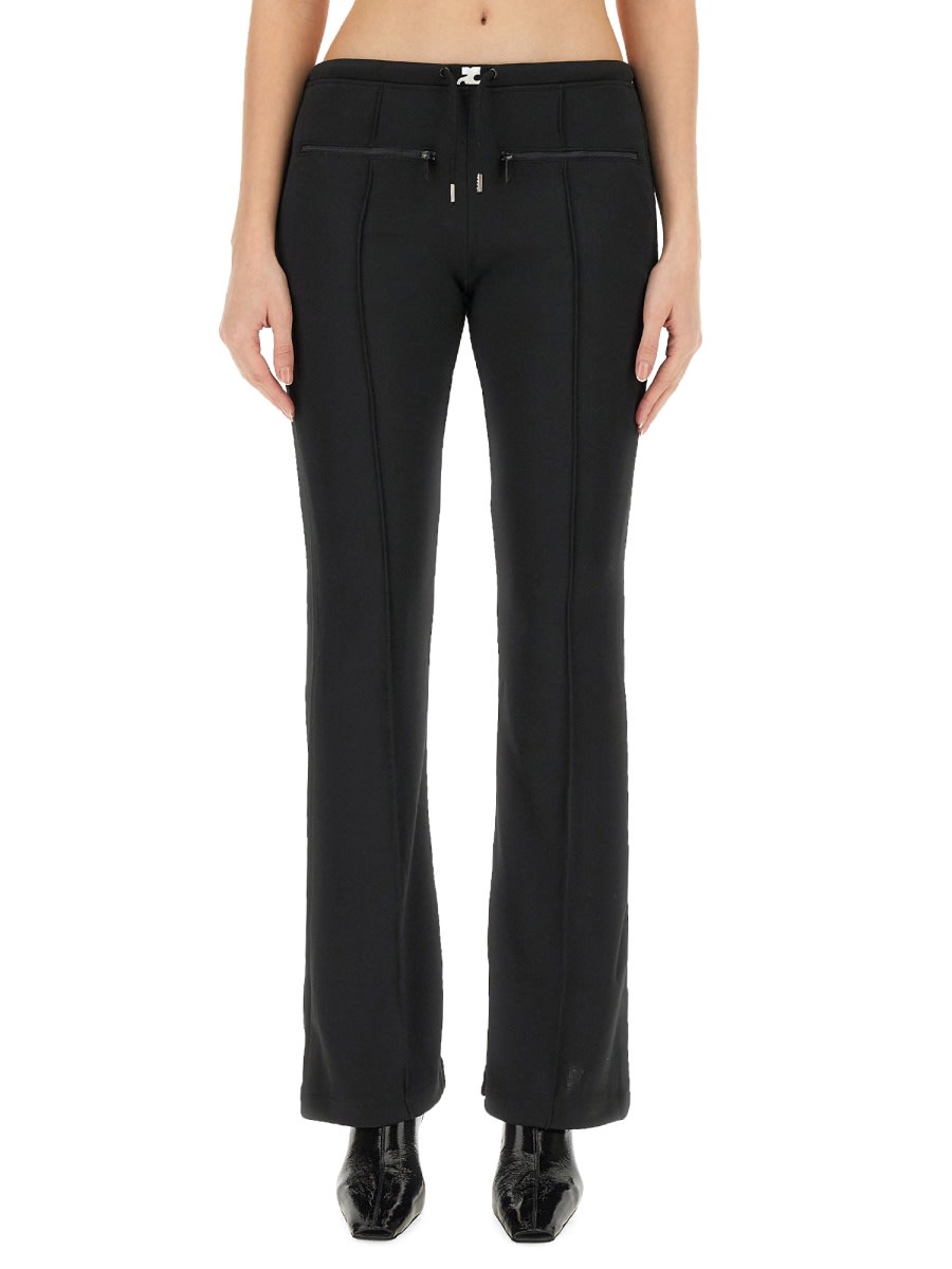 Shop Courrèges Slim Fit Pants In Black